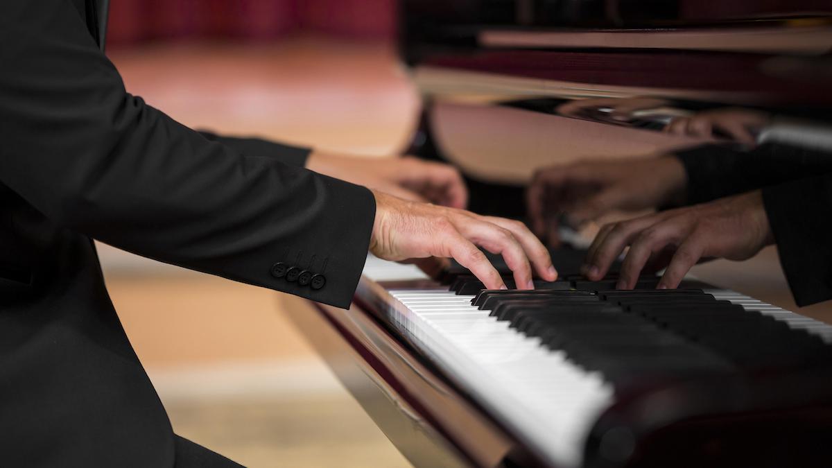 man-having-classical-piano-recital
